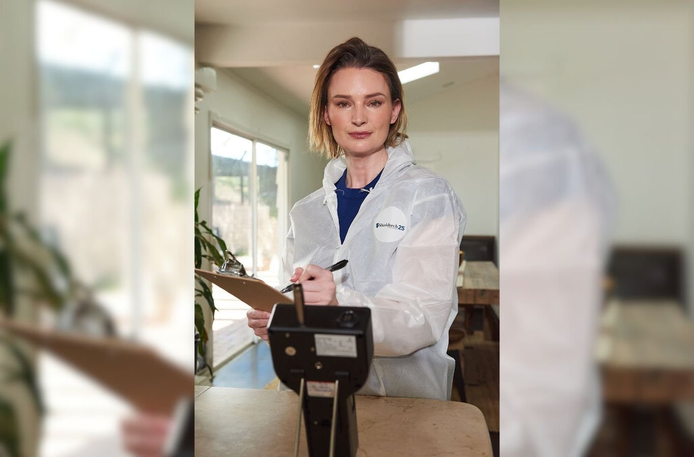 A certified Mold Inspection Canary expert testing air samples for mold in a Pacific Palisades, CA home, ensuring accurate results for homeowners.