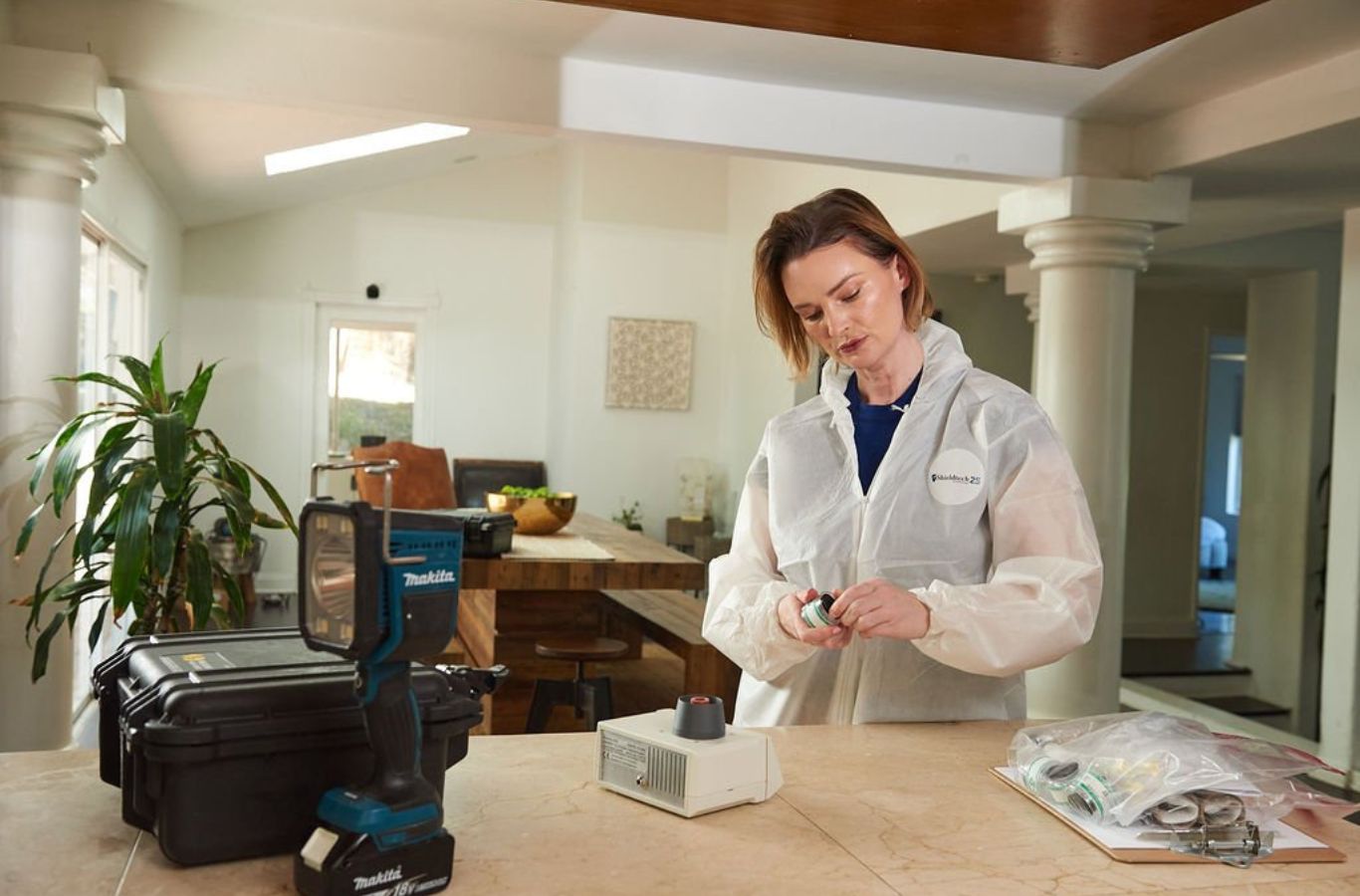 A Mold Inspection Canary expert using inspection tools in a Torrance, CA home during a professional mold inspection process.