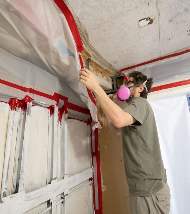 A Mold Inspection Canary team member performing a mold inspection in Malibu, highlighting the benefits of preventing mold damage early.